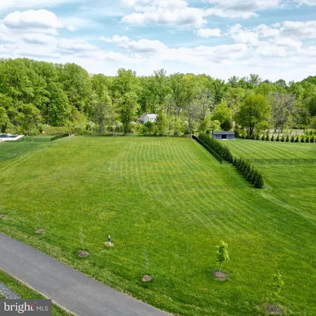 a view of a golf course with a lake