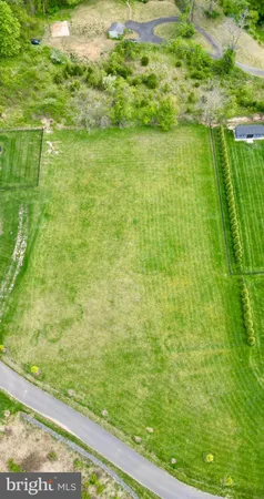 a view of a golf course with a lake