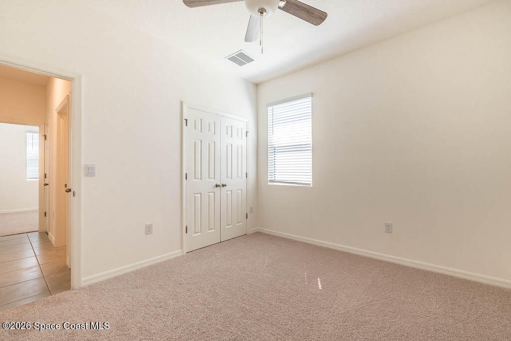 1863 Farmhouse Road Southeast Palm Bay, FL 32909 - Photo 26 of 44 a view of an empty room with a window