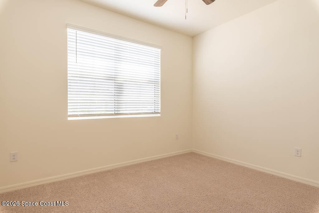 1863 Farmhouse Road Southeast Palm Bay, FL 32909 - Photo 30 of 44 an empty room with a window