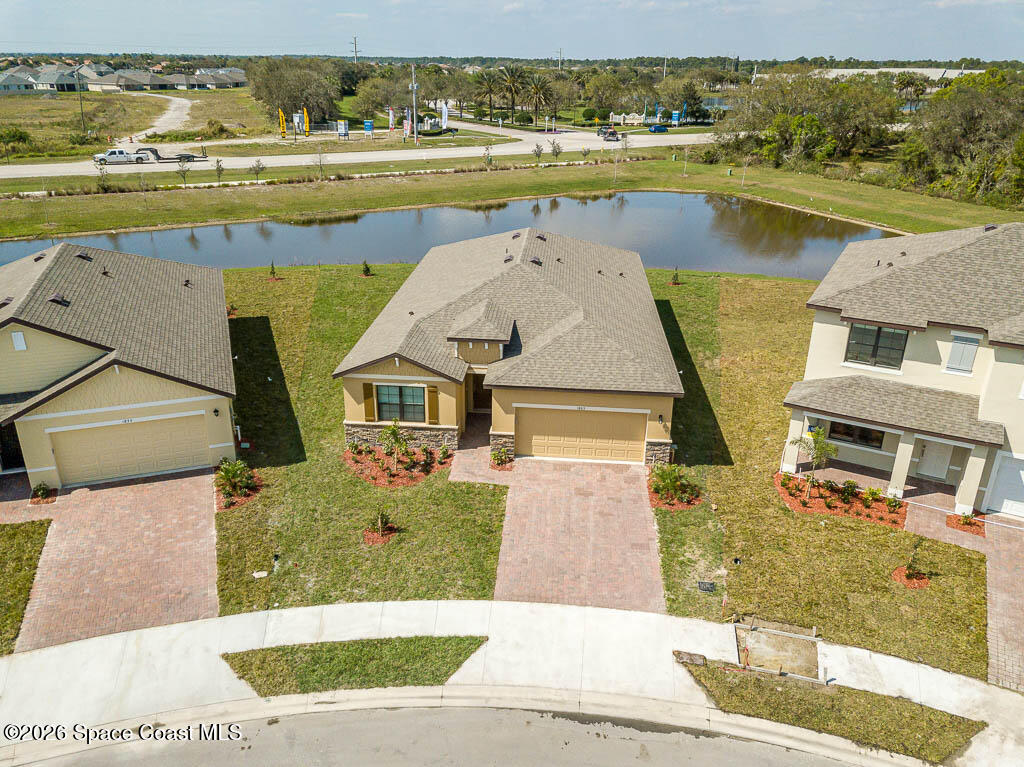 1863 Farmhouse Road Southeast Palm Bay, FL 32909 - Photo 37 of 44 an aerial view of a house with a ocean view