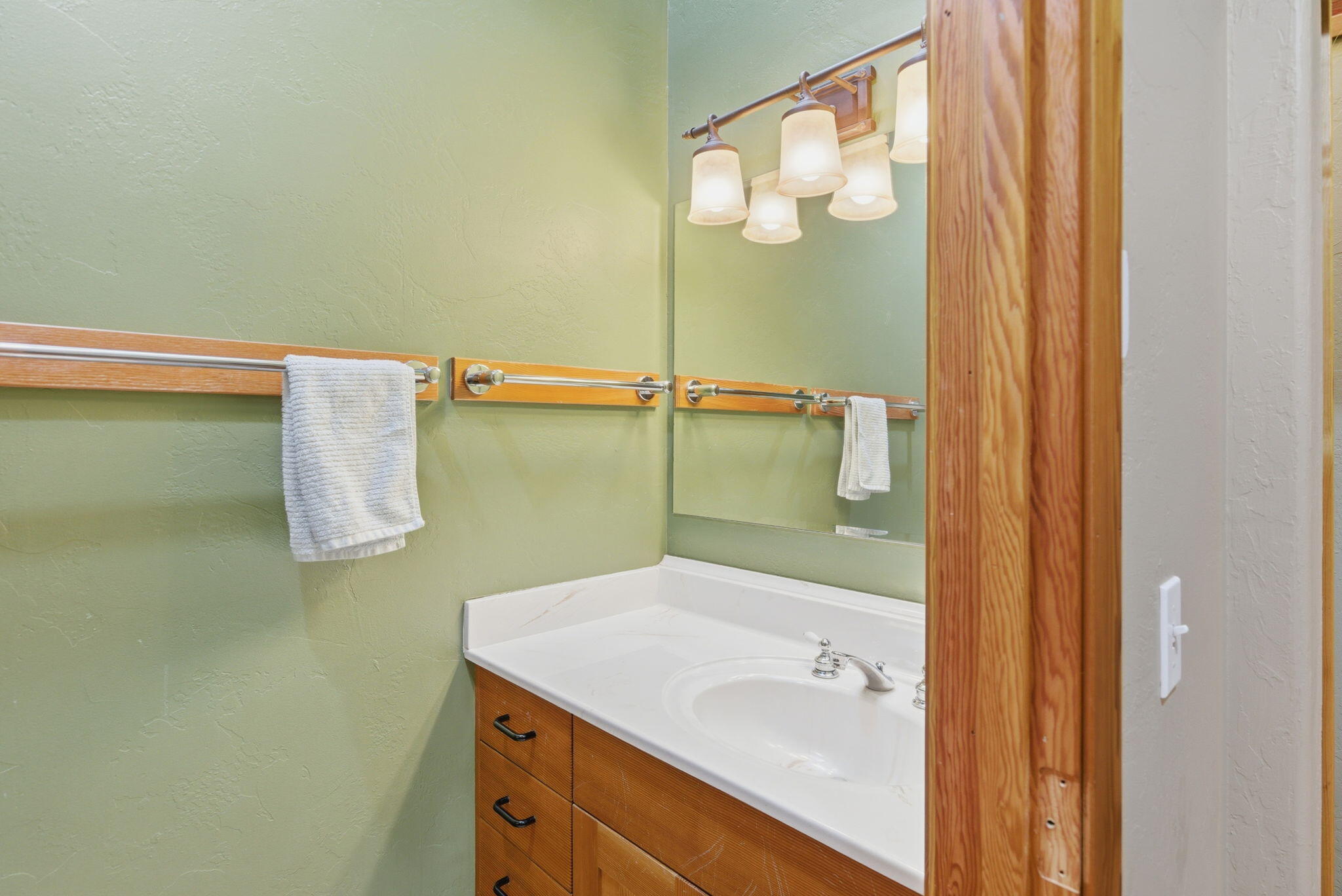 856 Greentree Loop Grants Pass, OR 97527 - Photo 34 of 62 a bathroom with a granite countertop sink a mirror and shower