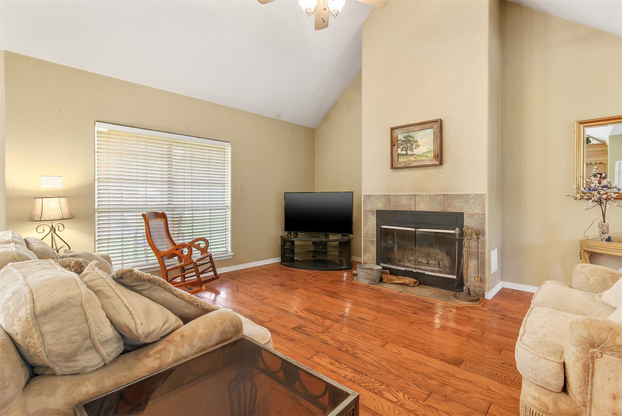 11692 Clark Lane Conroe, TX 77385 - Photo 4 of 35 The family room has a large picture window allowing for plenty of natural light and overlooks the tranquil backyard.