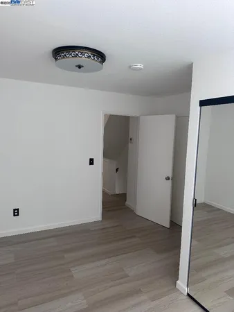 a kitchen with stainless steel appliances a sink and cabinets