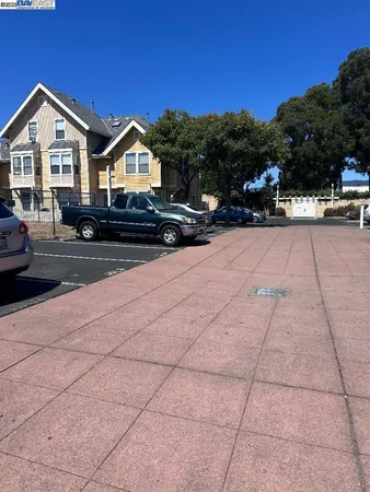 a view of multiple houses with a street