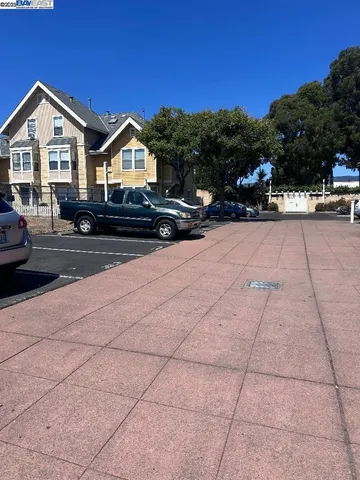 a view of multiple houses with a street