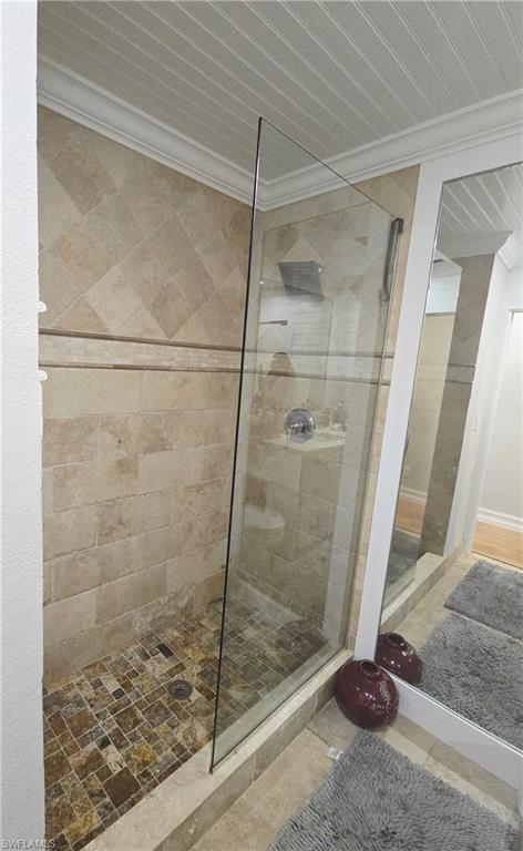 5321 Warren Street Naples, FL 34113 - Photo 13 of 21 a bathroom with a shower