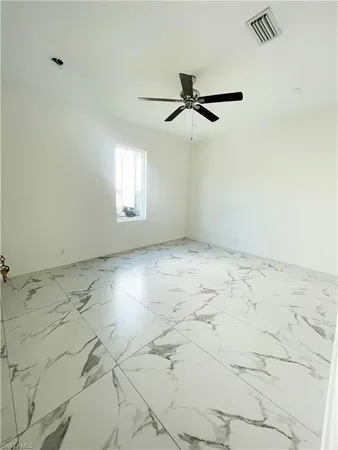 a view of kitchen and utility room