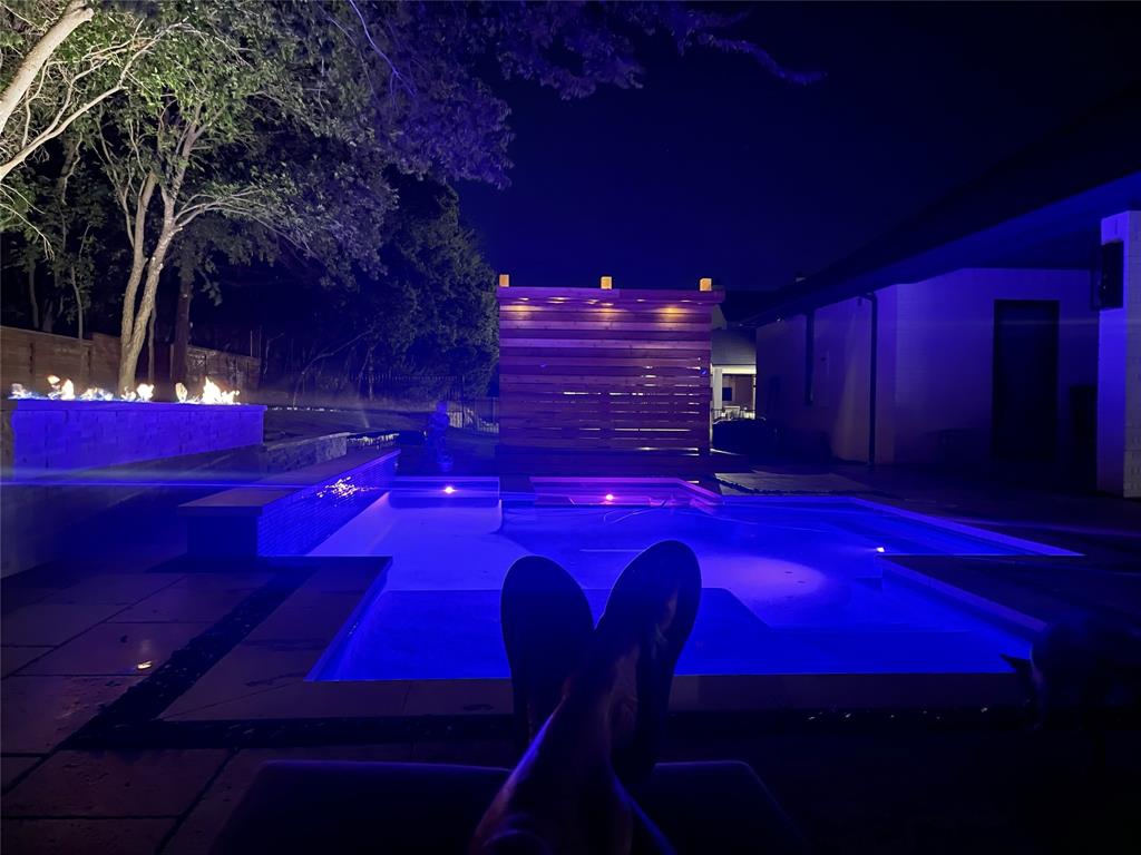 333 Renaissance Lane Heath, TX 75032 - Photo 9 of 35 Resort-style pool area featuring integrated spa, fire features, and a privacy screen