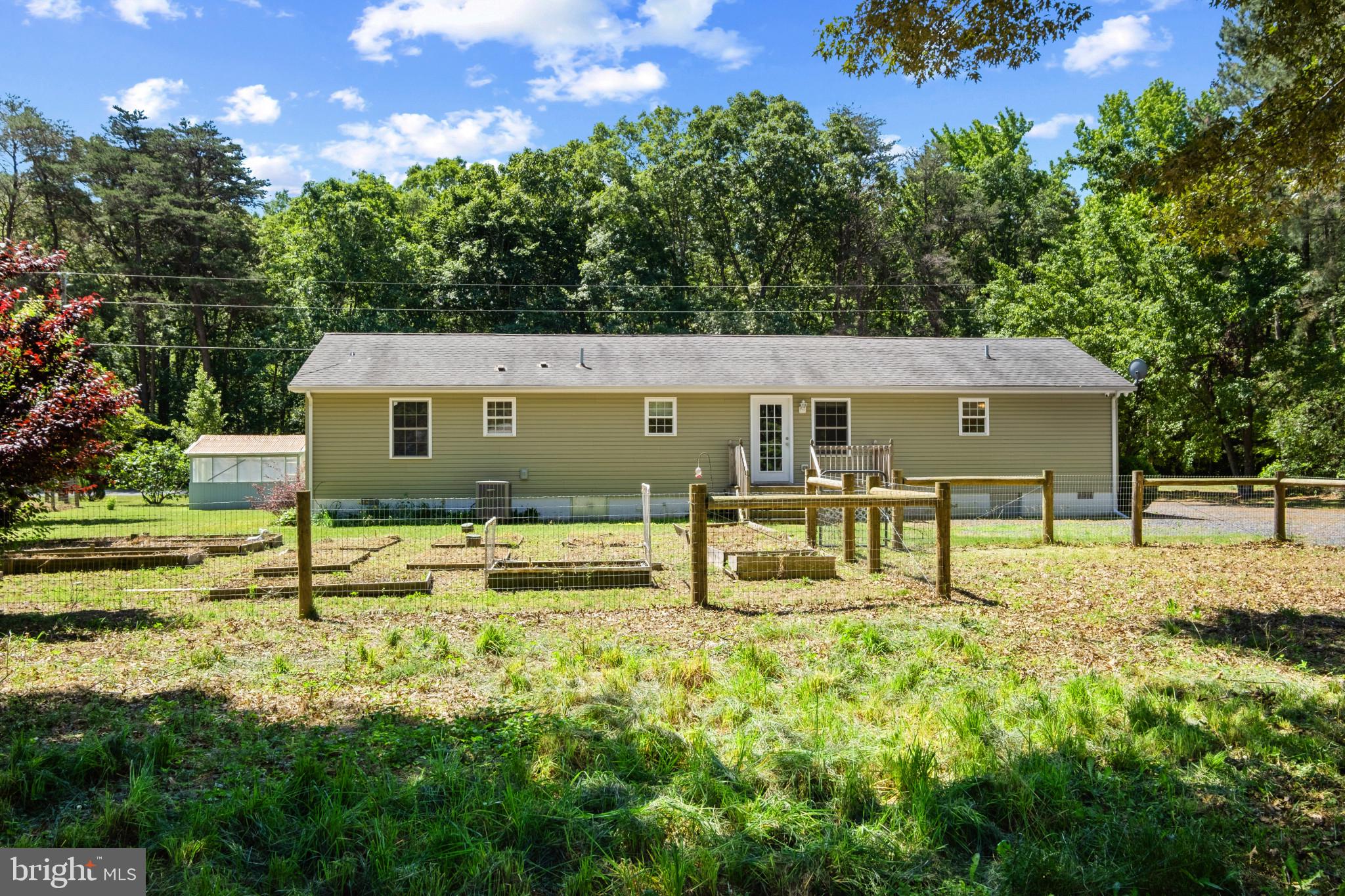 23116 Gilpin Point Road Preston, MD 21655 - Photo 2 of 66 Country backyard setting w/ endless possibilities.