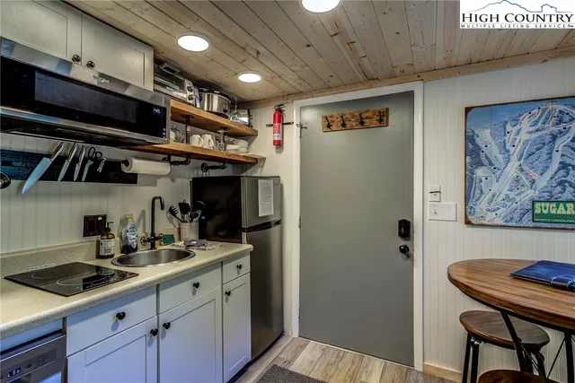 a view of a livingroom with furniture and a fireplace