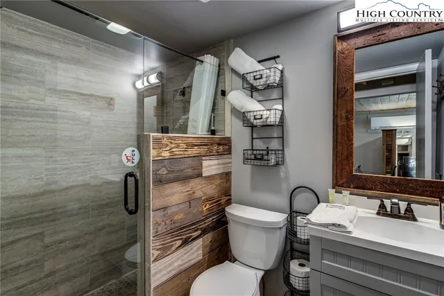 a bathroom with a toilet and a sink