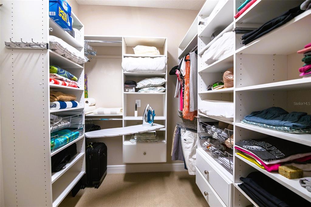 13153 Steinhatchee Loop Venice, FL 34293 - Photo 15 of 33 a kitchen with stainless steel appliances and cabinets