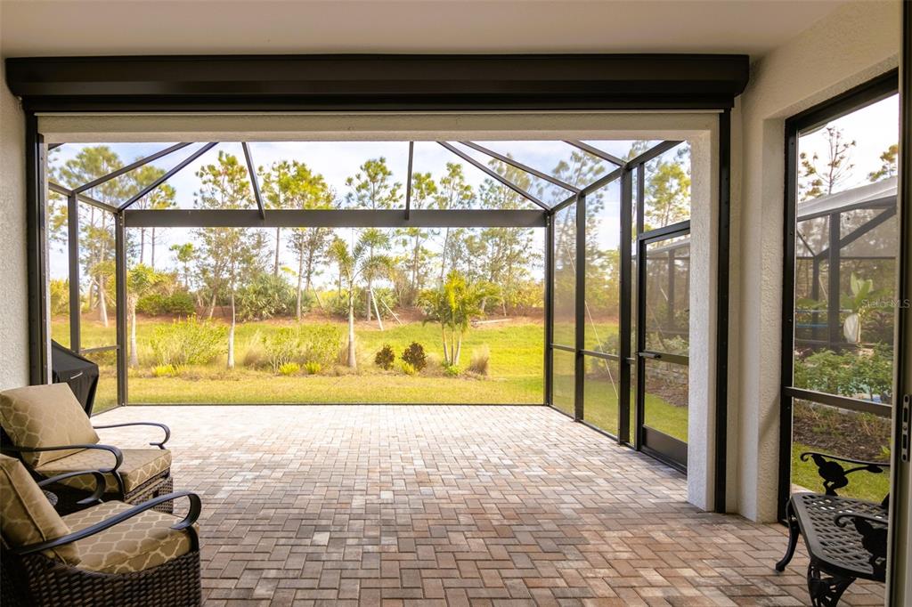 13153 Steinhatchee Loop Venice, FL 34293 - Photo 21 of 33 a view of room with furniture and a large window