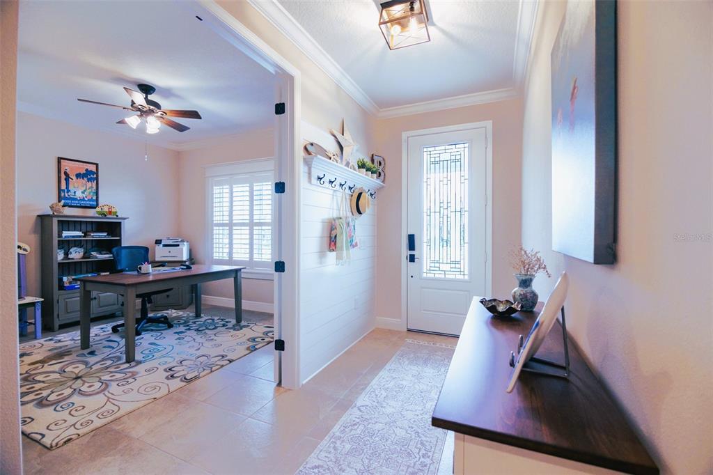 13153 Steinhatchee Loop Venice, FL 34293 - Photo 6 of 33 a view of a workspace with furniture and a window