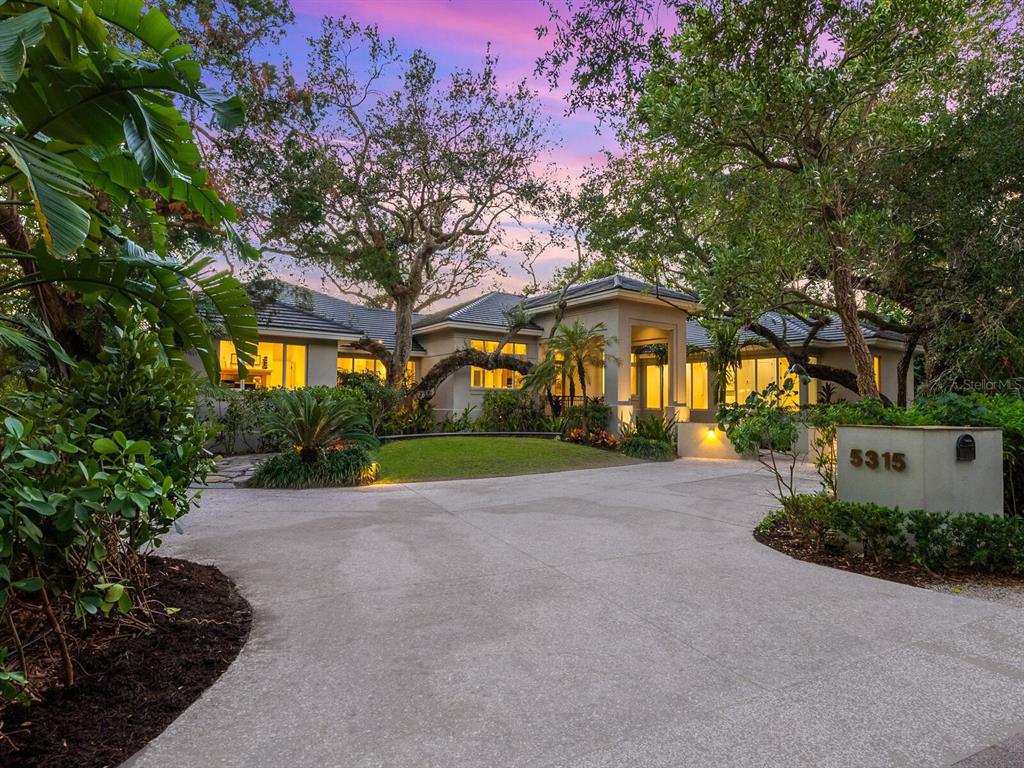 5315 Hidden Harbor Road Sarasota, FL 34242 - Photo 1 of 1 a view of a house with a yard and tree s