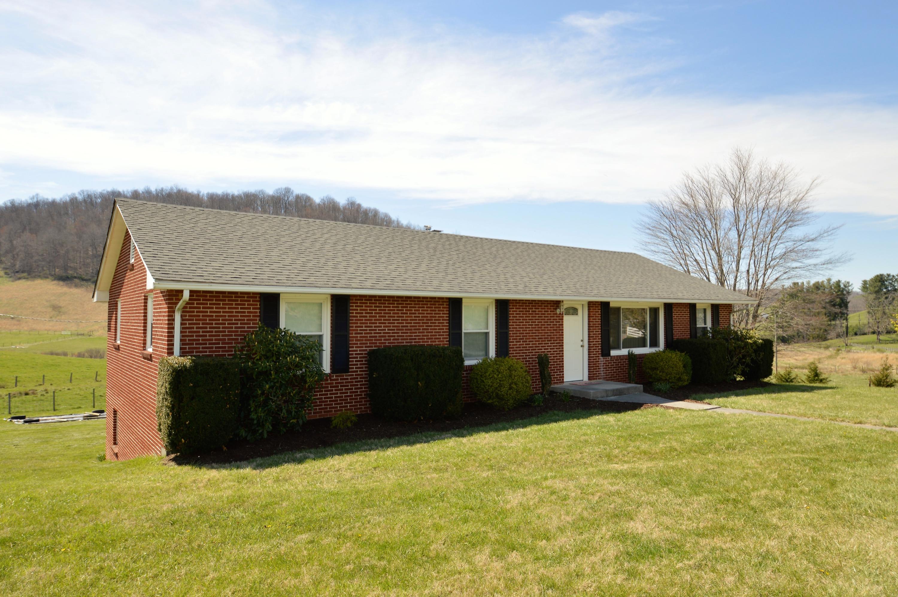 426 Poor Farm Road Southeast Floyd, VA 24091 - Photo 2 of 40 a view of a house with a yard