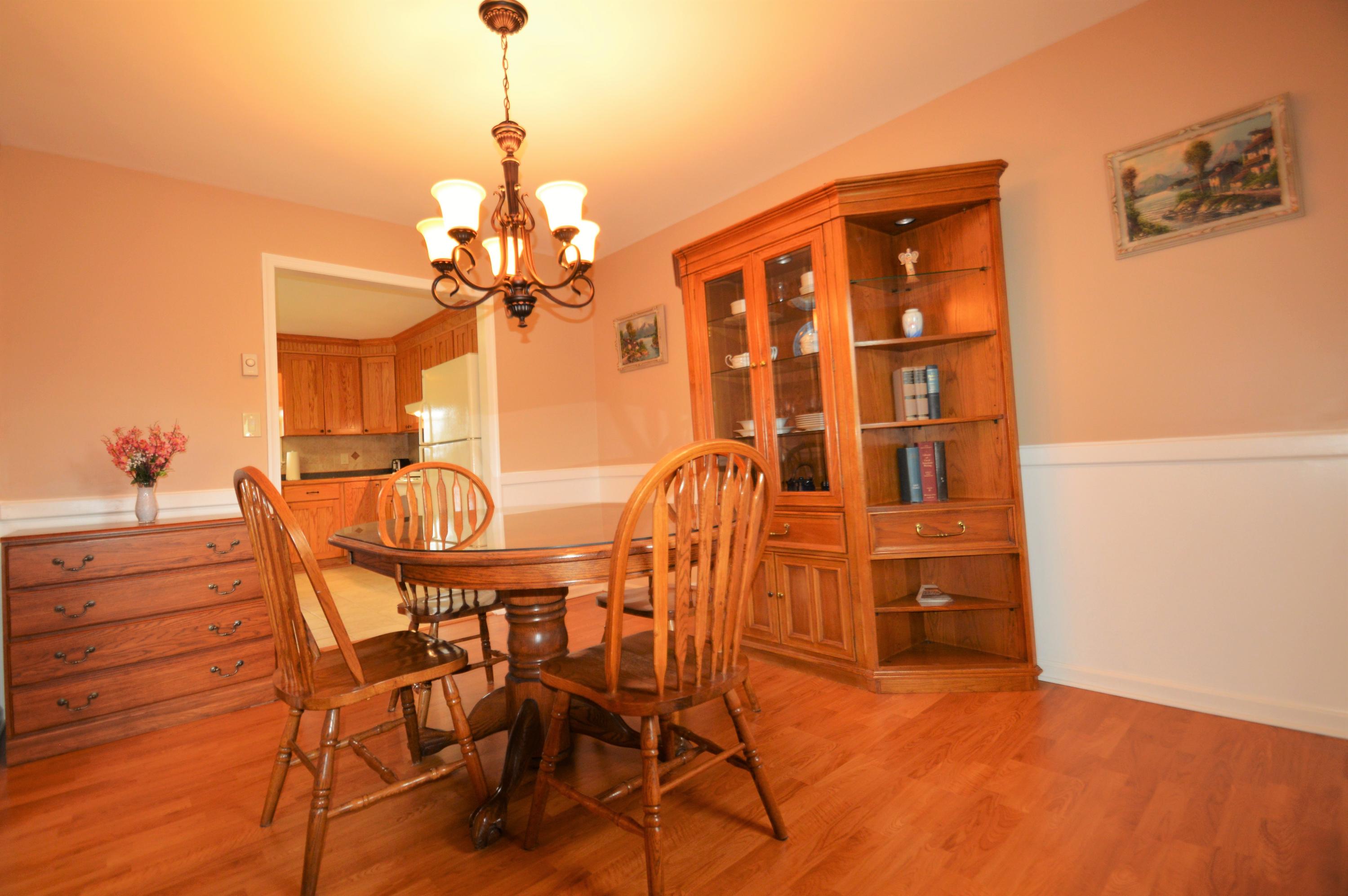 426 Poor Farm Road Southeast Floyd, VA 24091 - Photo 16 of 40 a dining room with furniture and window