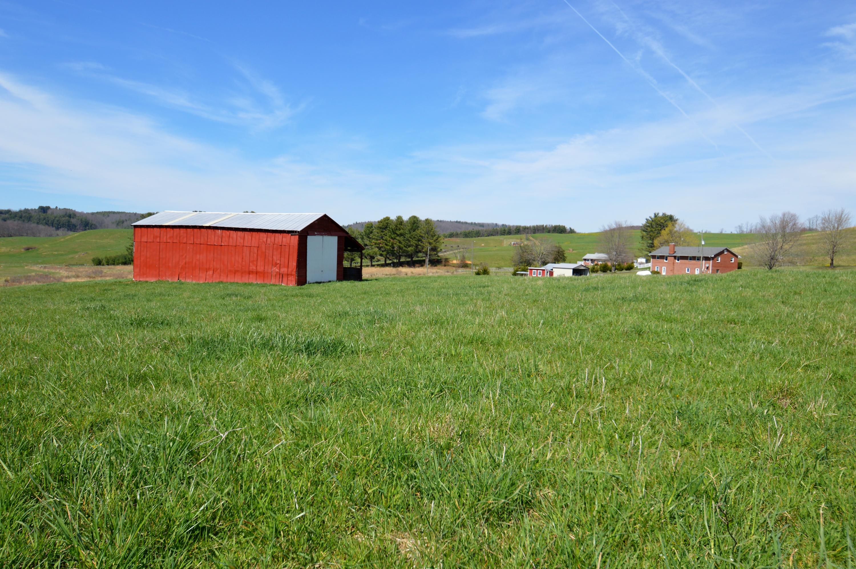 426 Poor Farm Road Southeast Floyd, VA 24091 - Photo 3 of 40 a view of a field with an ocean view