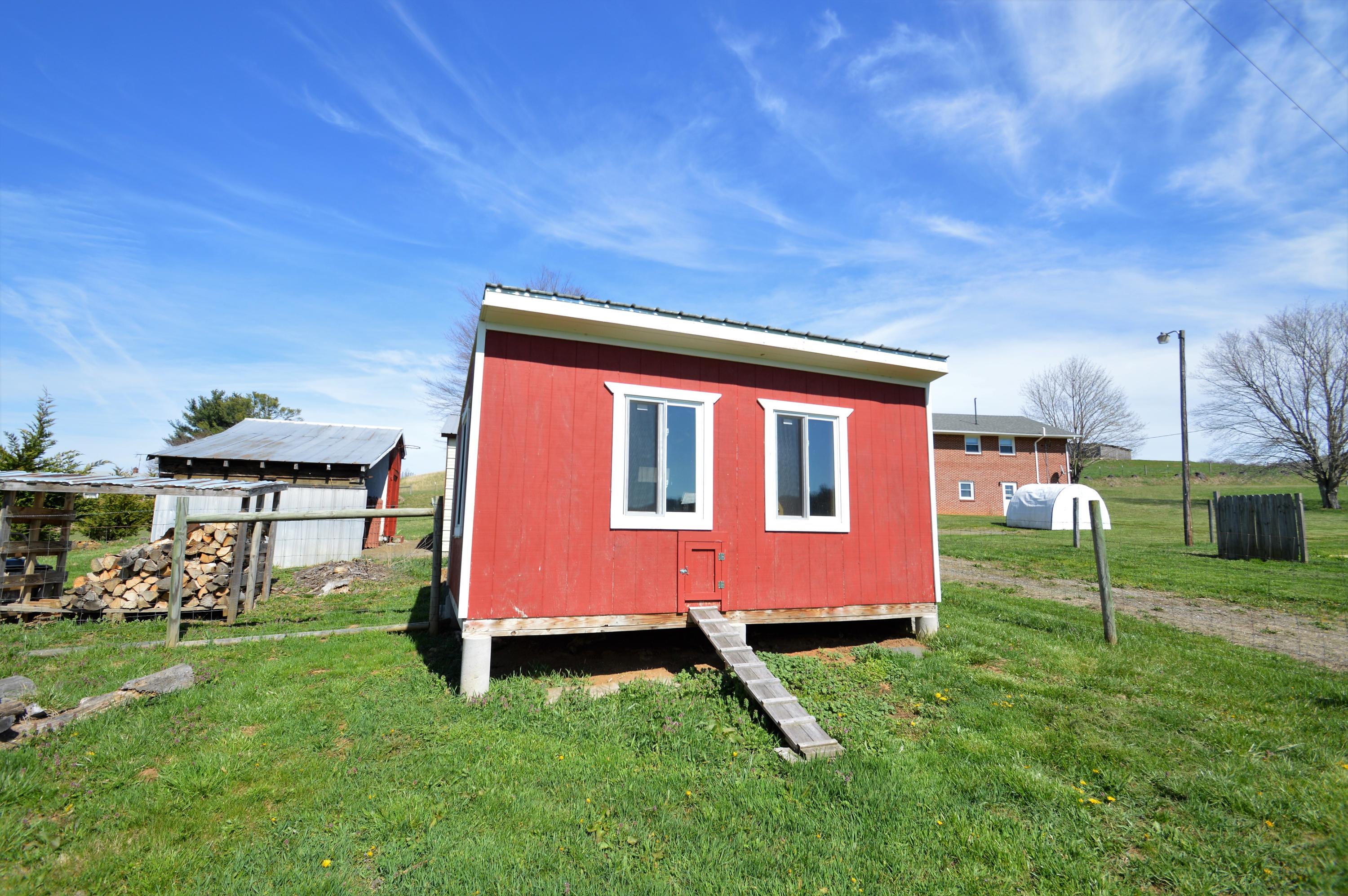 426 Poor Farm Road Southeast Floyd, VA 24091 - Photo 25 of 40 a backyard of a house with lots of green space