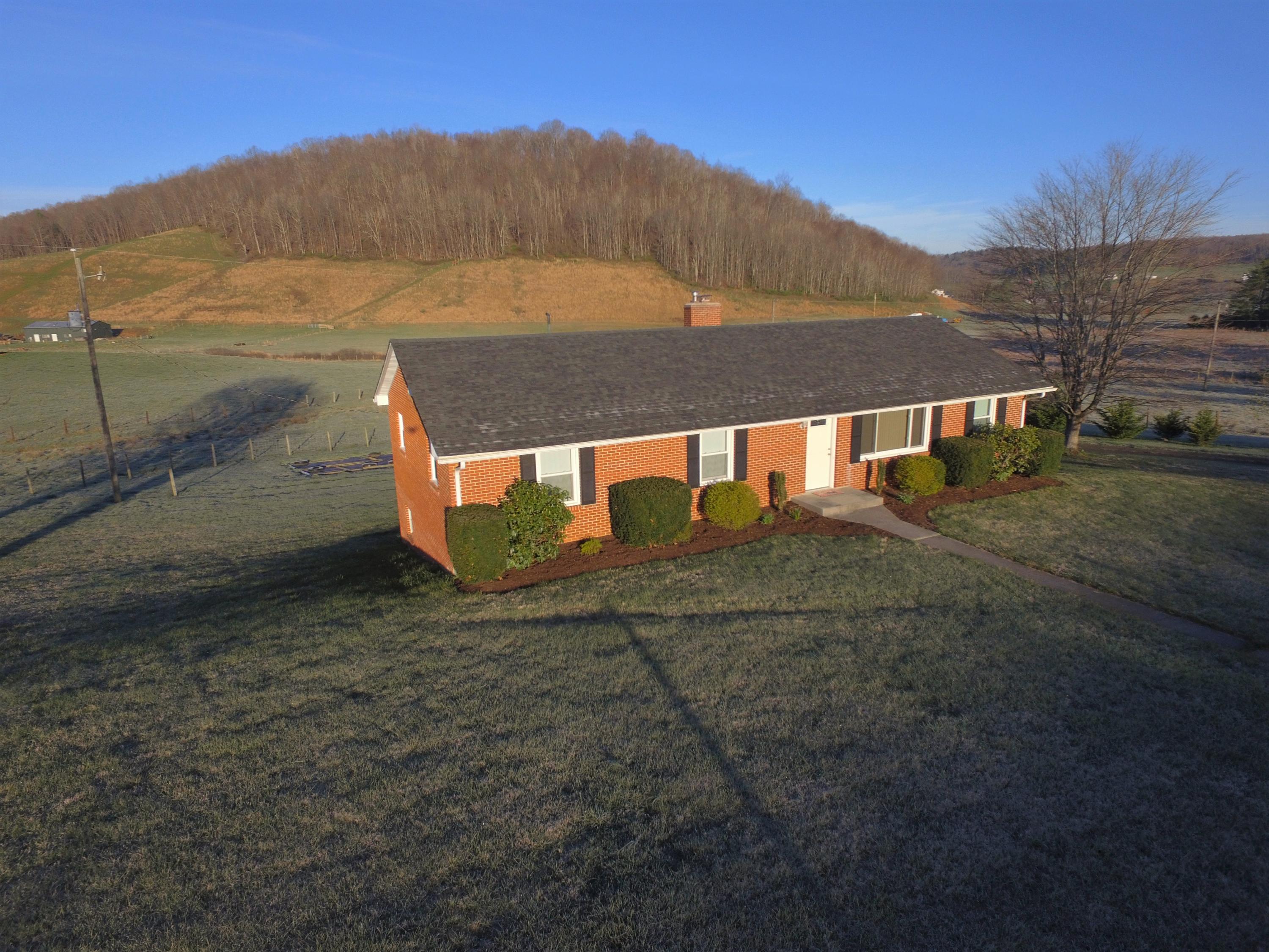 426 Poor Farm Road Southeast Floyd, VA 24091 - Photo 32 of 40 a view of an outdoor space and a yard