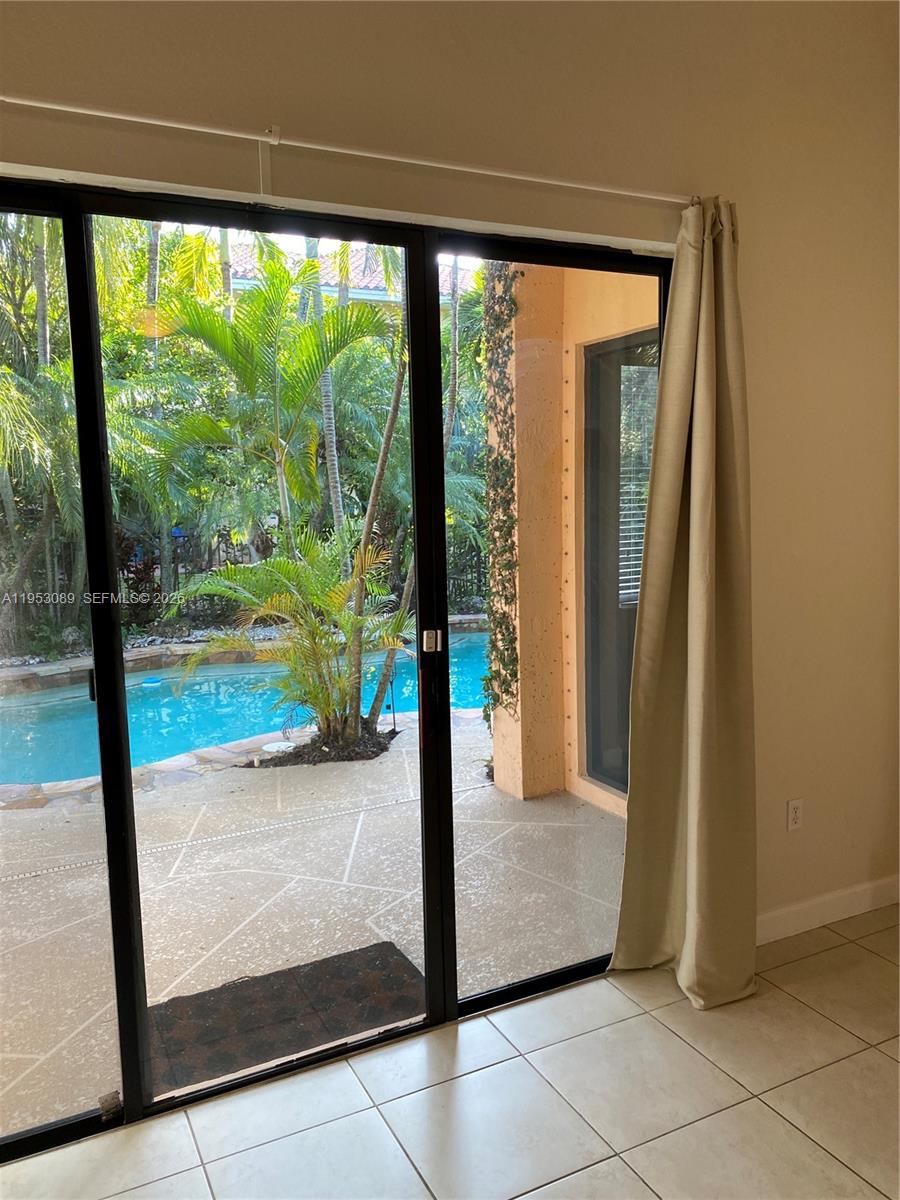 7564 Southwest 190th Street, Unit 7564 Cutler Bay, FL 33157 - Photo 11 of 22 a view interior of the house and window