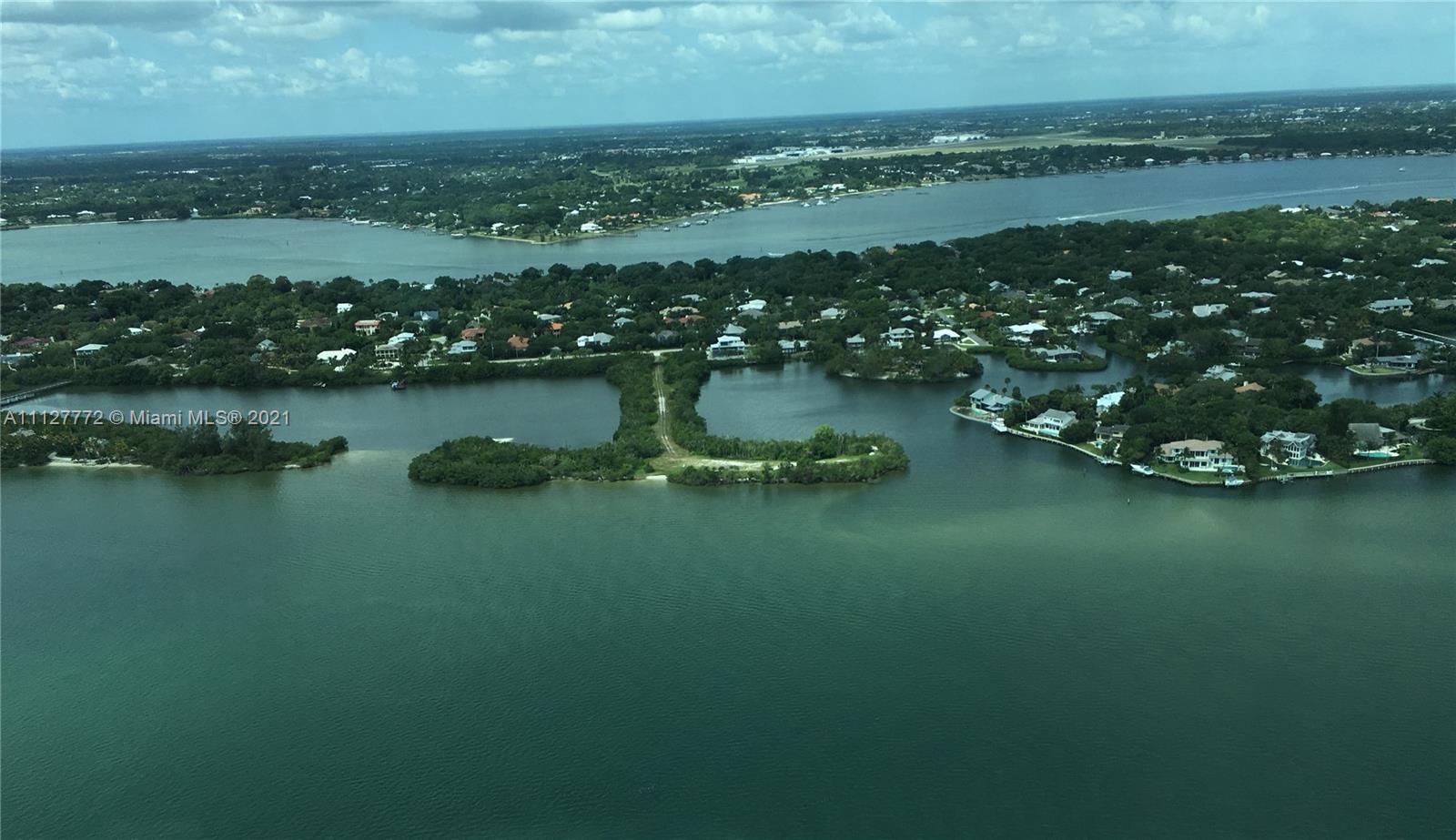 a view of a lake with a city