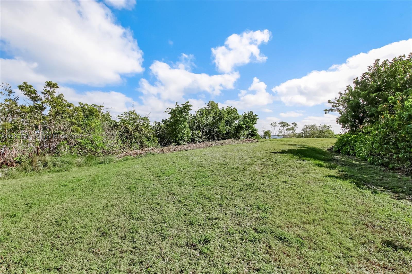 148-150 South Sewalls Point Road Stuart, FL 34996 - Photo 27 of 59 a view of a green field