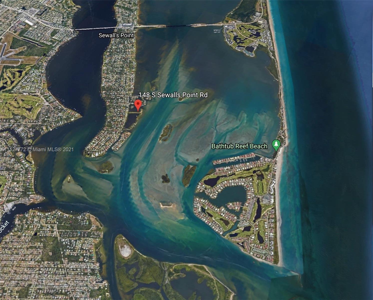 148-150 South Sewalls Point Road Stuart, FL 34996 - Photo 4 of 59 an aerial view of a golf course