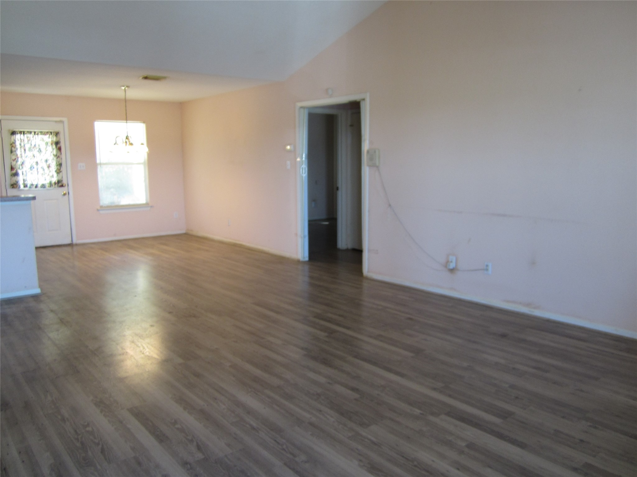20697 Pierceall Road Hempstead, TX 77445 - Photo 17 of 35 Spacious living area with laminate flooring creating an inviting atmosphere.
Kitchen is open to the dining and living room. Stay in touch with the family when your in the kitchen.