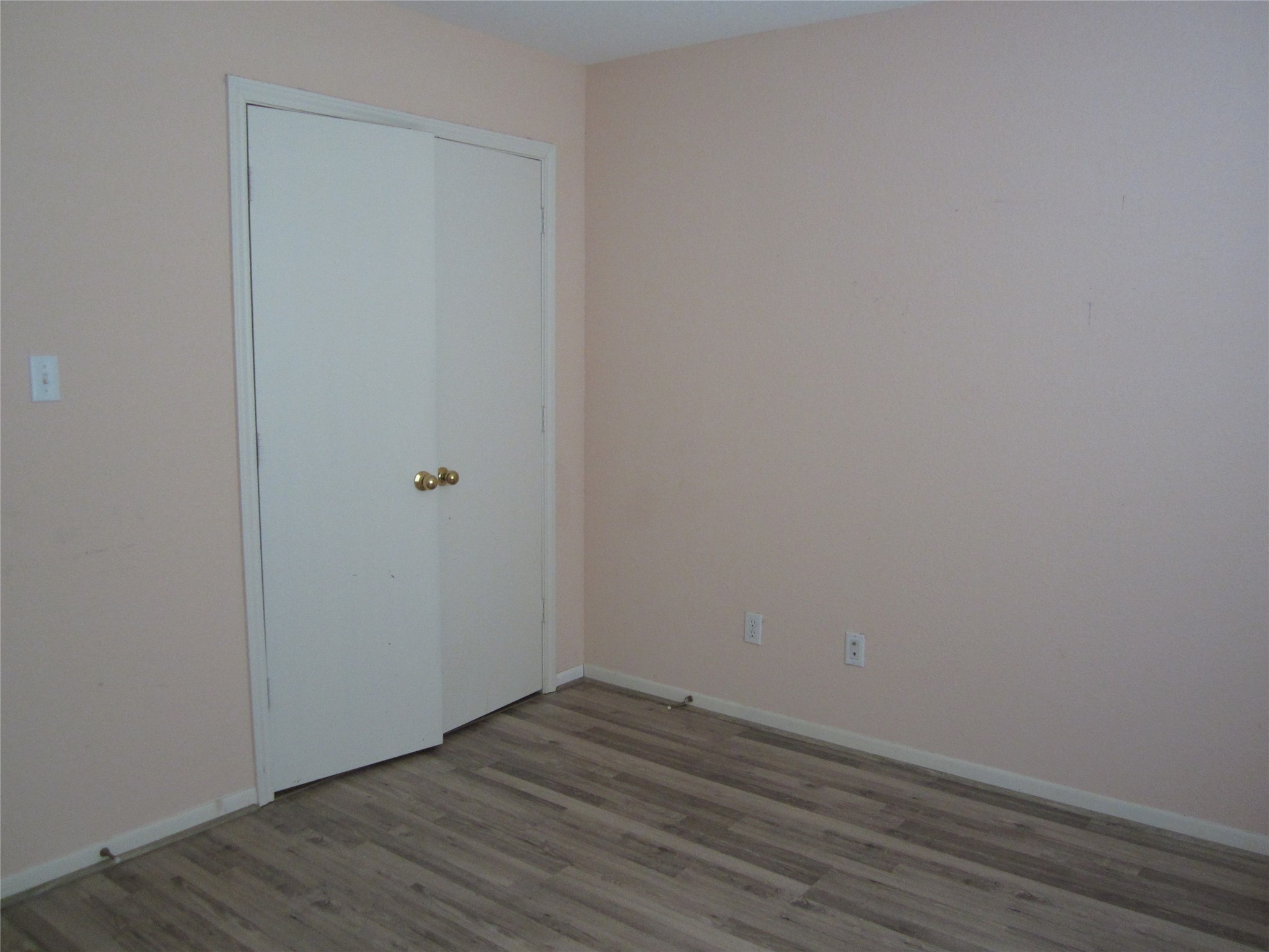 20697 Pierceall Road Hempstead, TX 77445 - Photo 25 of 35 Front Secondary bedroom The space has a simple, clean appearance suitable for a bedroom or office. Faces front of the property.