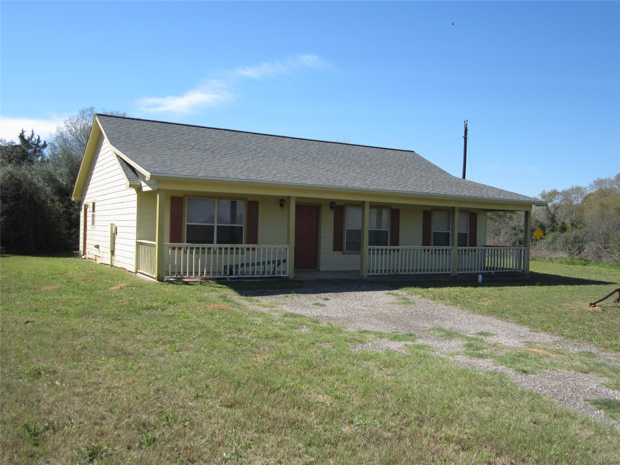 20697 Pierceall Road Hempstead, TX 77445 - Photo 3 of 35 It is offering a peaceful rural setting. Ideal for those seeking a cozy and quiet living space.