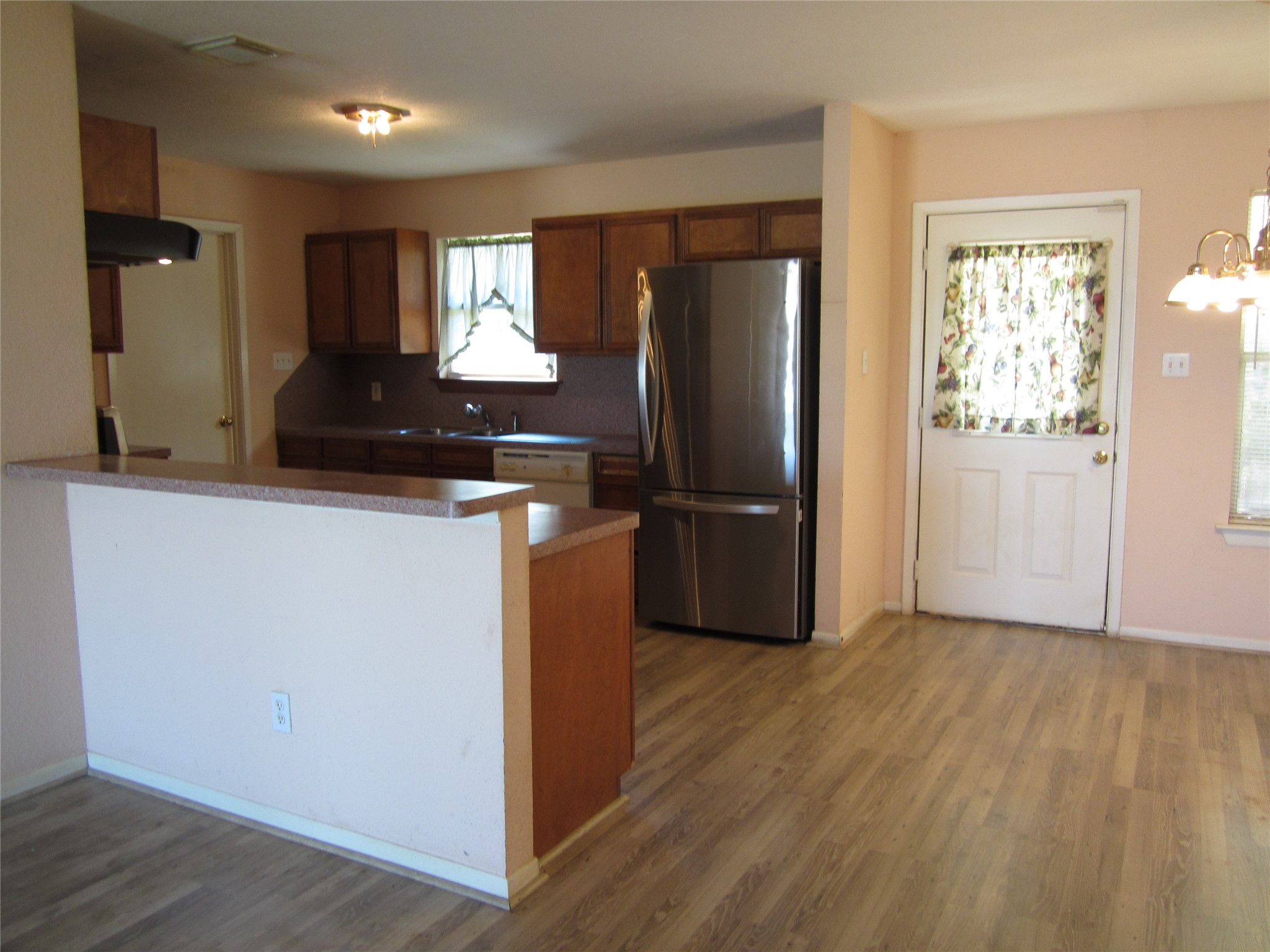 20697 Pierceall Road Hempstead, TX 77445 - Photo 9 of 35 This photo shows a cozy kitchen features a breakfast bar.