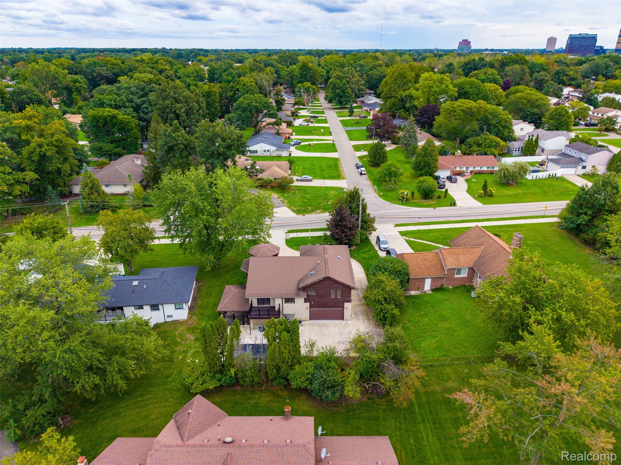 27507 Bell Road Southfield, MI 48034 - Photo 69 of 81 Aerial perspective showcasing a residential neighborhood with verdant tree canopy