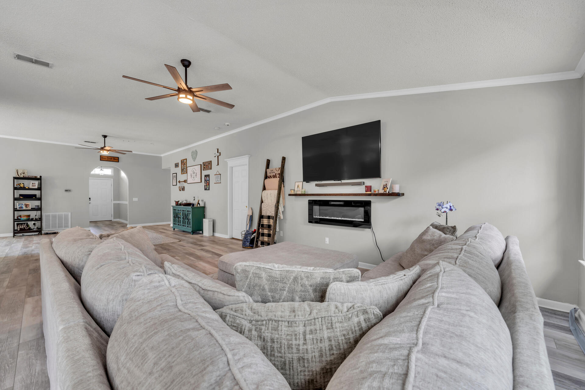 318 Peggy Drive Crestview, FL 32536 - Photo 15 of 47 a bedroom with a bed and a flat screen tv