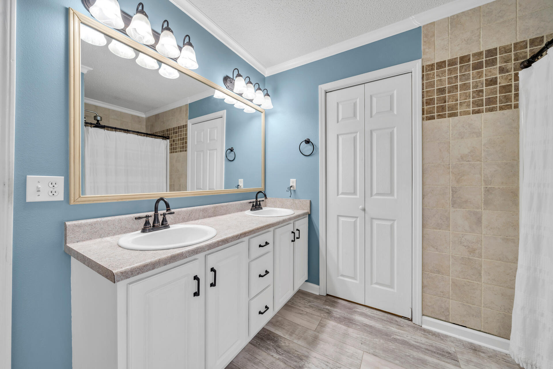 318 Peggy Drive Crestview, FL 32536 - Photo 28 of 47 a spacious bathroom with a double vanity sink mirror and double