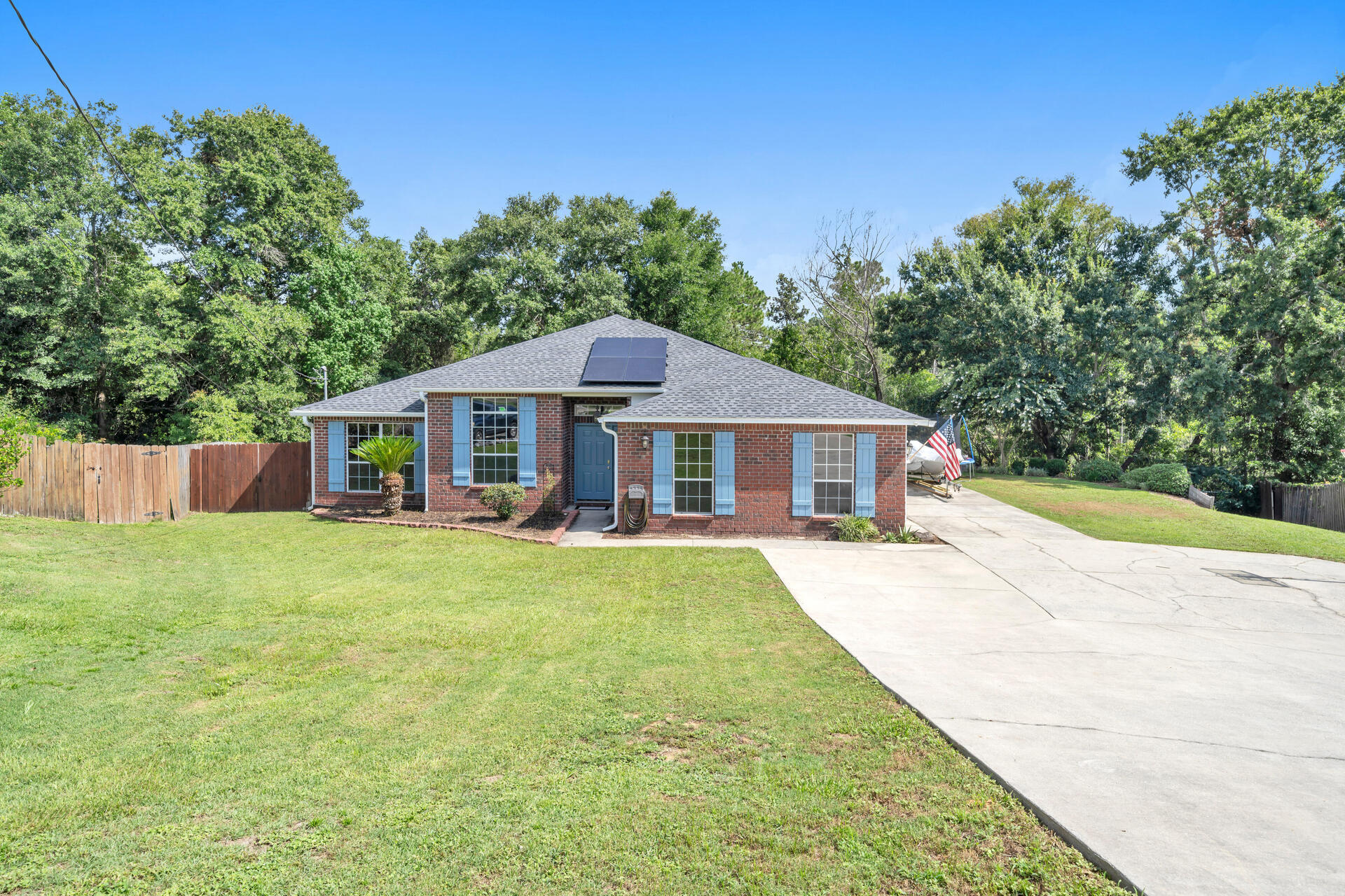 318 Peggy Drive Crestview, FL 32536 - Photo 3 of 47 a front view of house with yard and green space