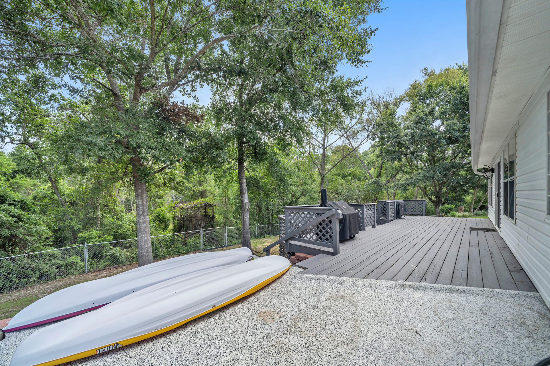 318 Peggy Drive Crestview, FL 32536 - Photo 39 of 47 a view of balcony with wooden floor and outdoor seating