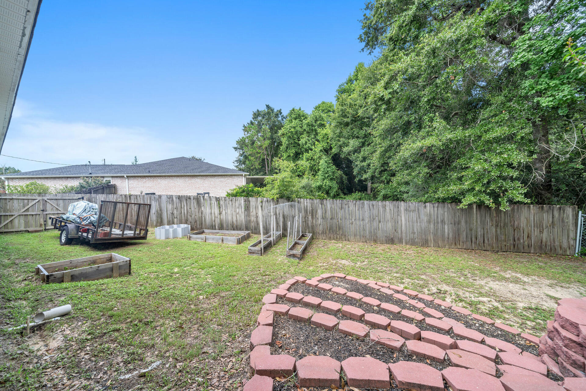 318 Peggy Drive Crestview, FL 32536 - Photo 42 of 47 a view of a backyard with a slide