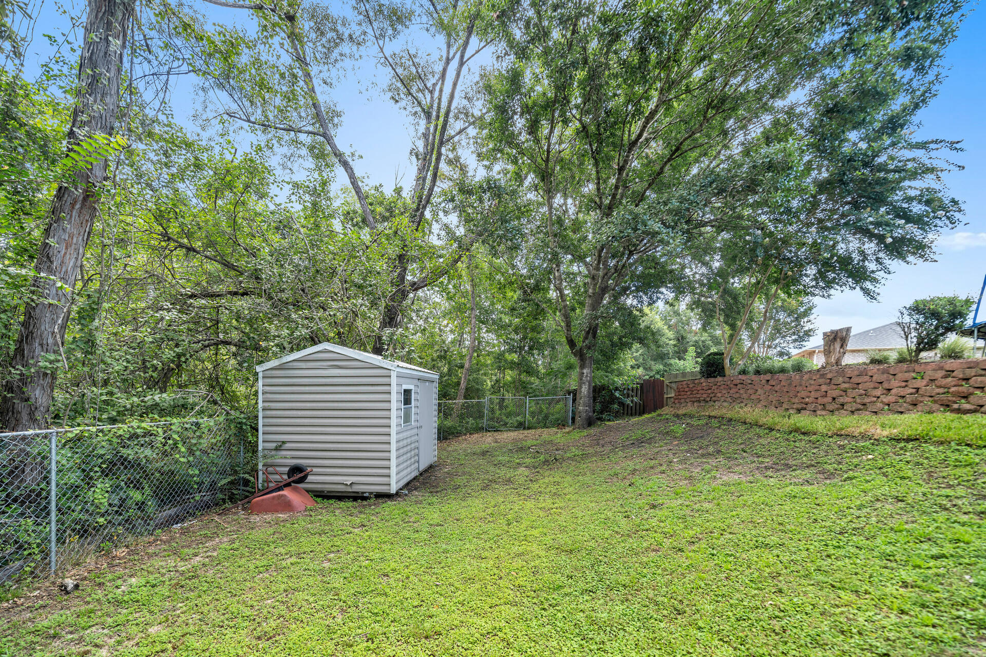 318 Peggy Drive Crestview, FL 32536 - Photo 44 of 47 a view of a backyard with entertaining space