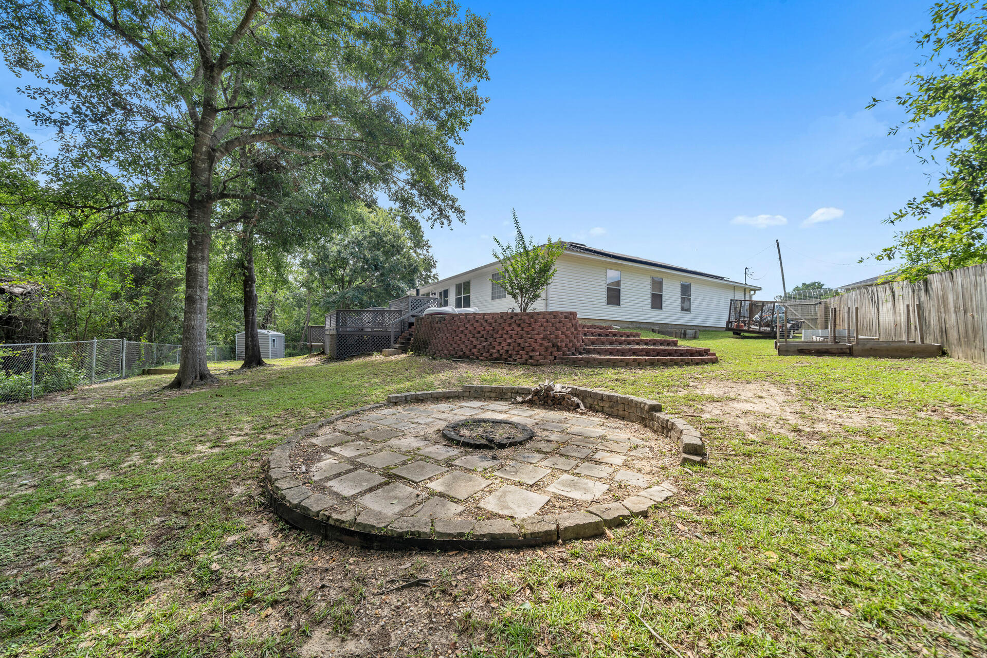 318 Peggy Drive Crestview, FL 32536 - Photo 46 of 47 a view of a house with a yard
