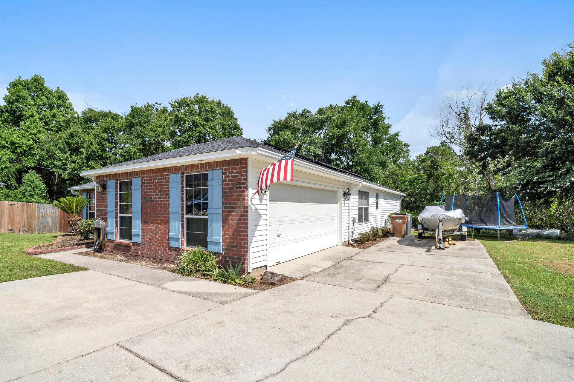 318 Peggy Drive Crestview, FL 32536 - Photo 5 of 47 a backyard of a house with seating space