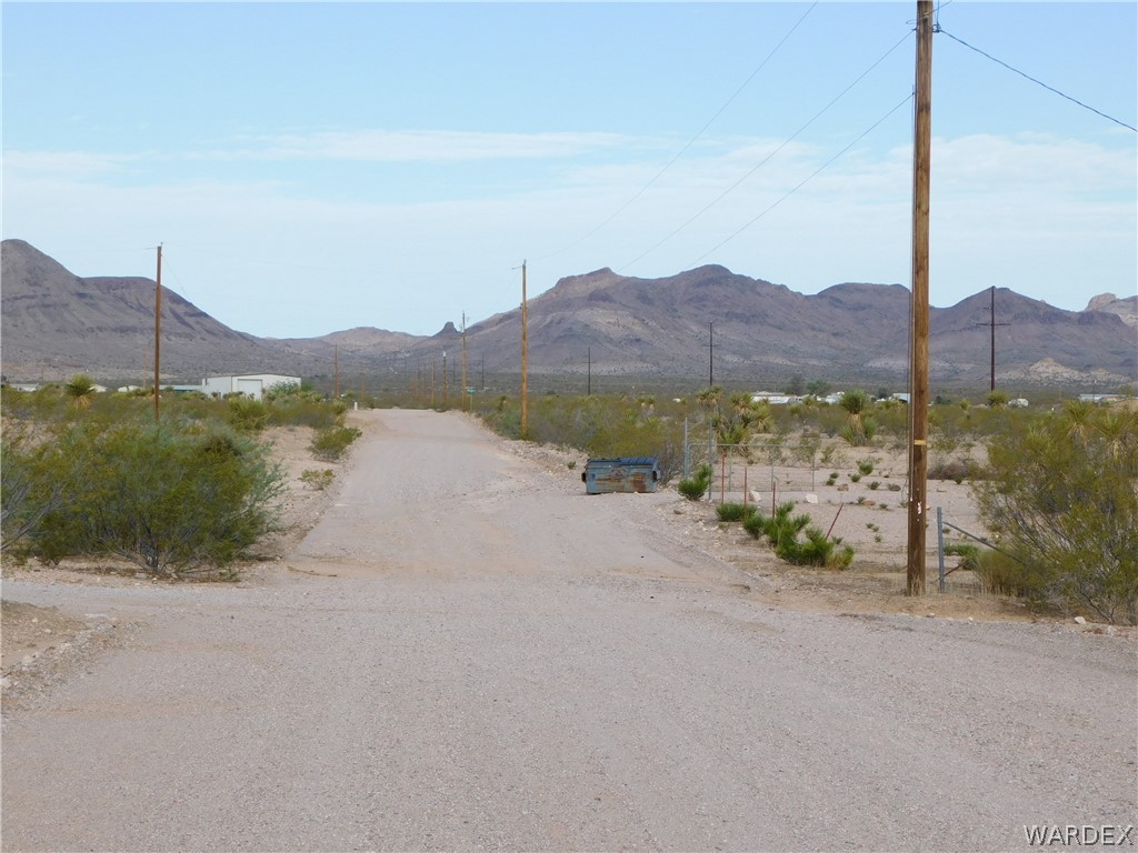 0 South Dragoon Road Golden Valley, AZ 86413 - Photo 3 of 14 a view of a lake with a mountain