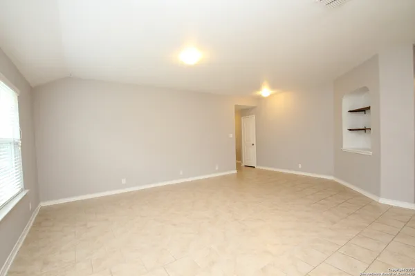 an empty room with a natural light