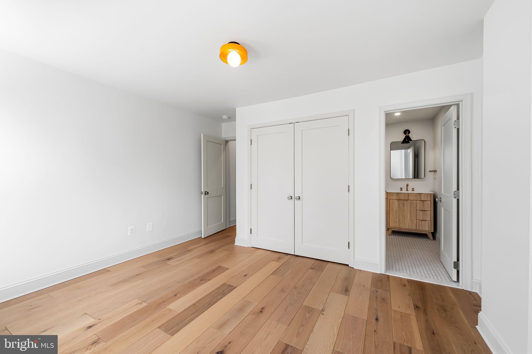 3539 Roland Avenue Baltimore, MD 21211 - Photo 23 of 31 En-suite bathroom and closet storage