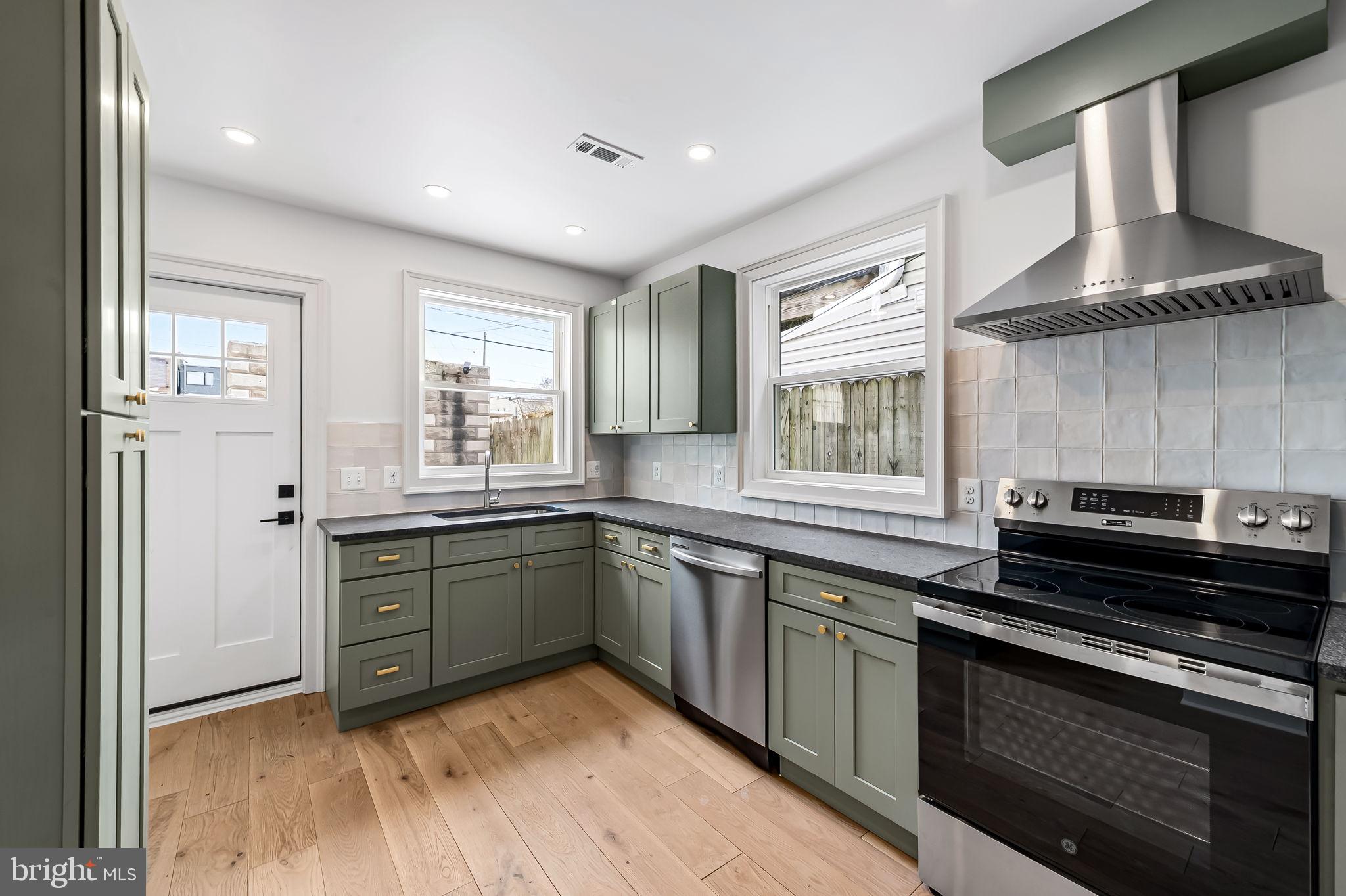 3539 Roland Avenue Baltimore, MD 21211 - Photo 7 of 31 Kitchen opens into patio - great for entertaining