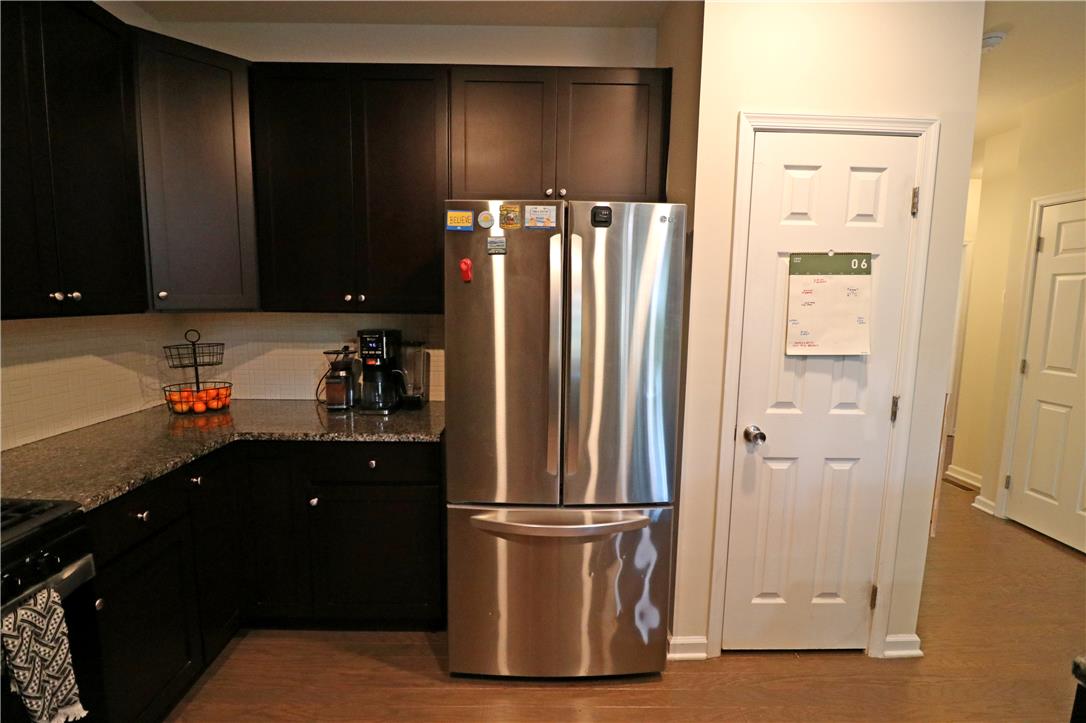 4502 Benjamin Court Emmaus, PA 18049 - Photo 12 of 53 Granite counters and stainless steel appliances complete this functional kitchen.