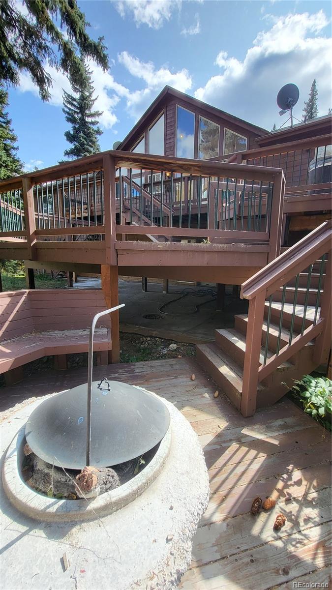 294 Red Tail Trail Evergreen, CO 80439 - Photo 22 of 35 a view of a house with a balcony
