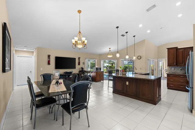 a view of a dining room kitchen and furniture