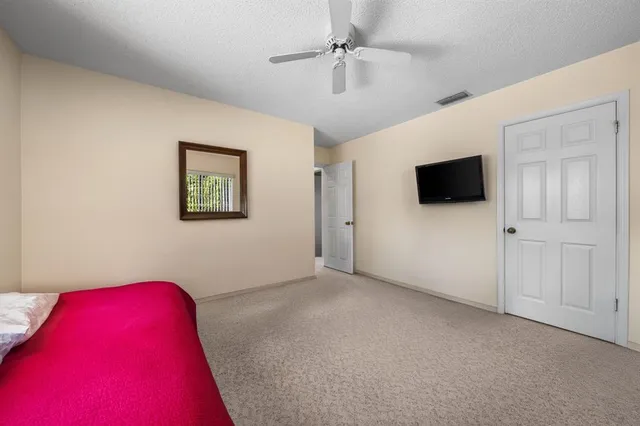a view of a livingroom with a flat screen tv
